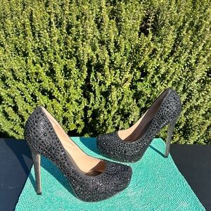 This is a Lauren Lorraine black rhinestone-embellished stiletto heelpeep-toePUMP